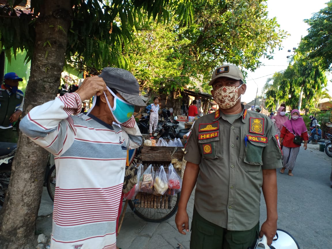 SOSIALISASI PROTOKOL COVID - 19 DAN PENERTIBAN MASKER