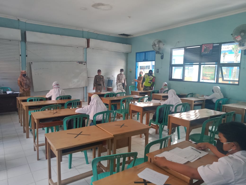GIAT PEMANTAUAN UJI COBA PEMBELAJARAN TATAP MUKA DI SMA N 1 PADANGAN